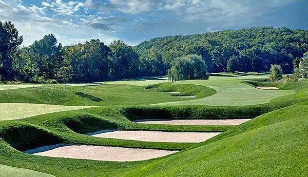New England tournament artwork with river-blue accents and tight fairway geometry.